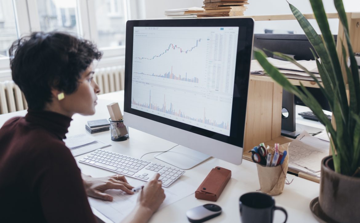 A Hardworking Latin-American Businesswoman Watching At Some Data And Gathering Some Information
